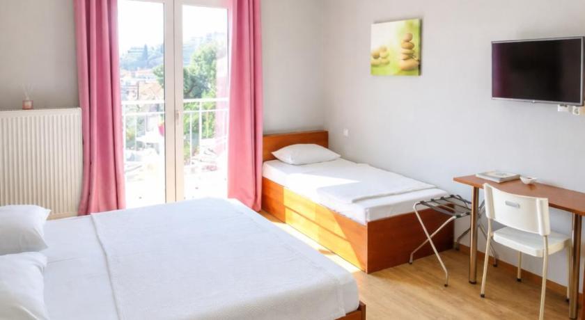 Image of Triple Room with Balcony and View 0