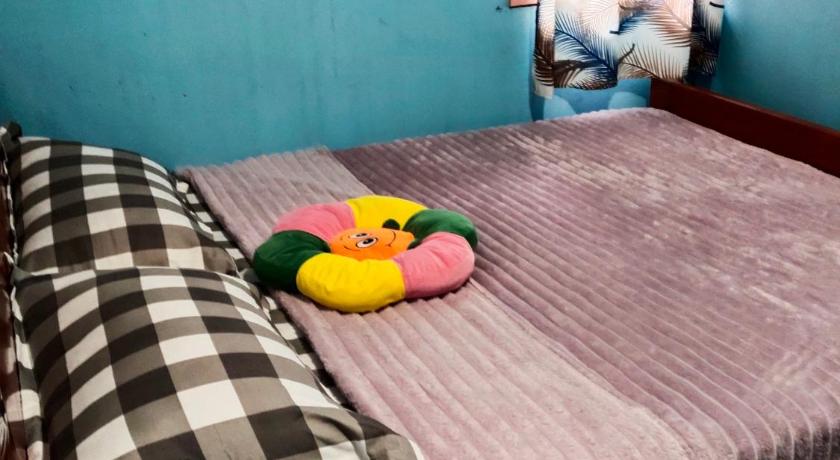 Image of Economy Quadruple Room with Shared Bathroom 0