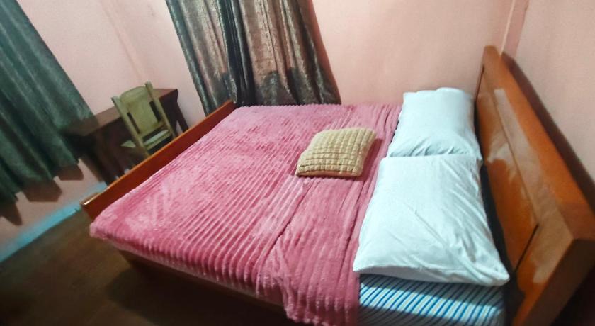 Image of Economy Quadruple Room with Shared Bathroom 1