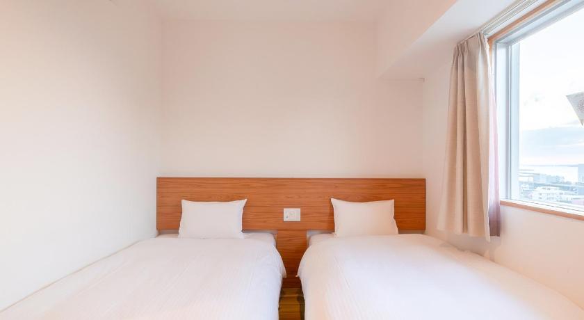Gambar Bilik Twin Termasuk Pancuran Mandian (Twin Room with Shower) 1
