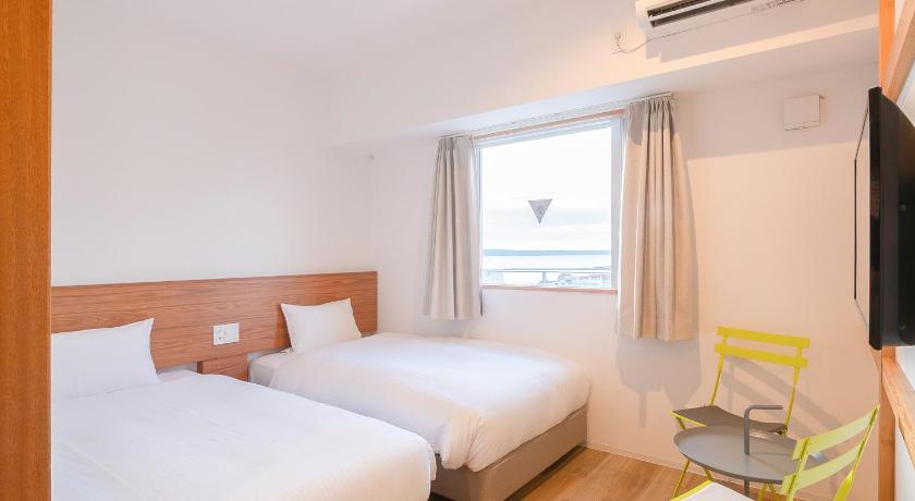 Gambar Bilik Twin Termasuk Pancuran Mandian (Twin Room with Shower) 0