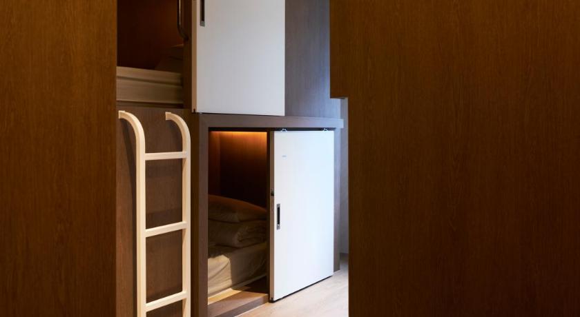 Image of Single Bed in Female Dormitory Room 0