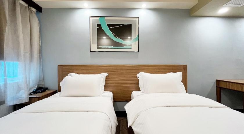Ảnh của Phòng Deluxe 2 Giường đơn (Deluxe Twin) 1