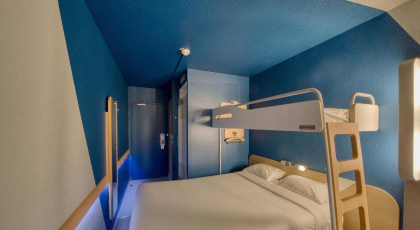 Triple - room with a double bed and a single bu nk bed.的照片 13