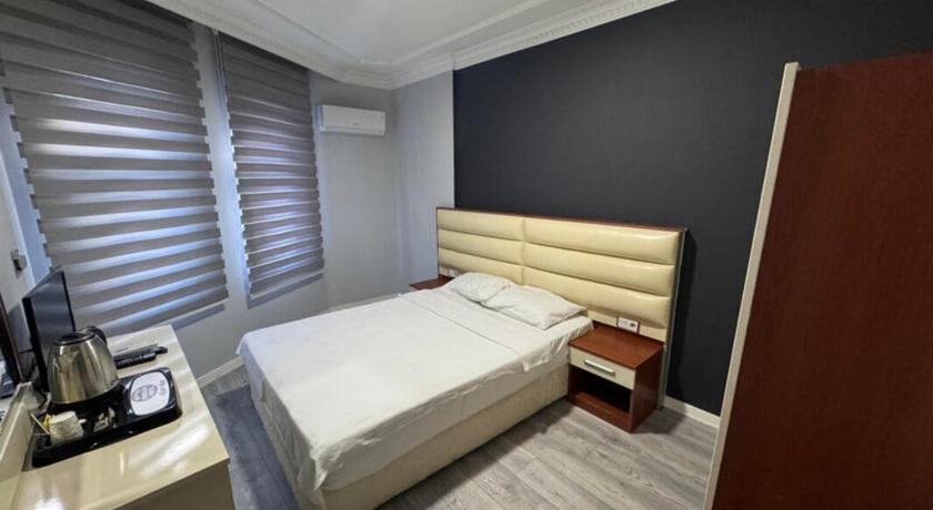 Imatge de Habitació Deluxe Triple (Deluxe Triple Room) 1