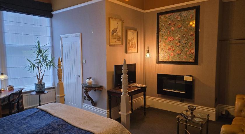 Image of Four-Poster Ground Floor Room Ensuite 0