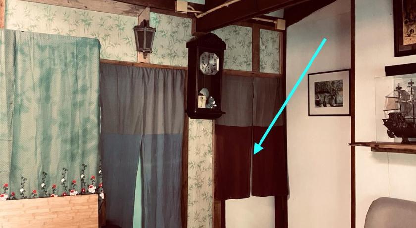 Image of Triple Room with Shared Bathroom 7