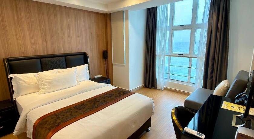 รูปของห้องดีลักซ์สวีทพร้อมวิวทะเล (Deluxe Suite with Sea View) 6