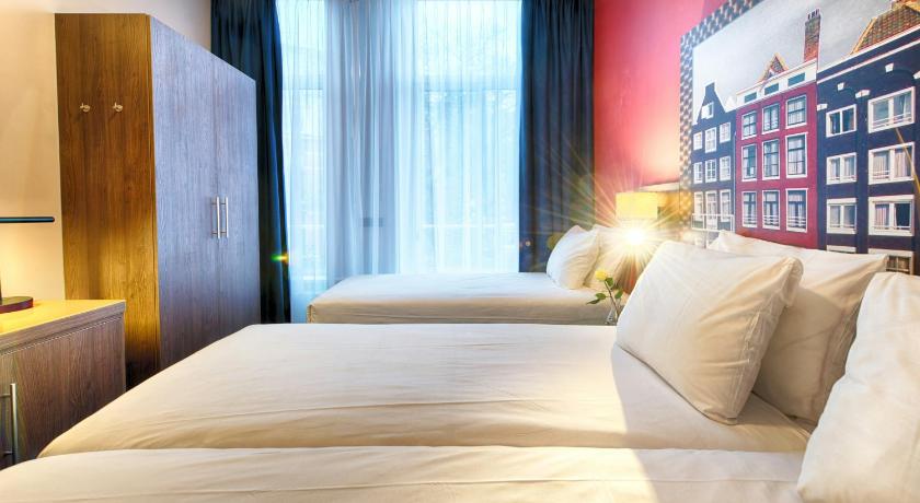 Image of Comfort Room 1 Twin Bed 1 Single Bed 0