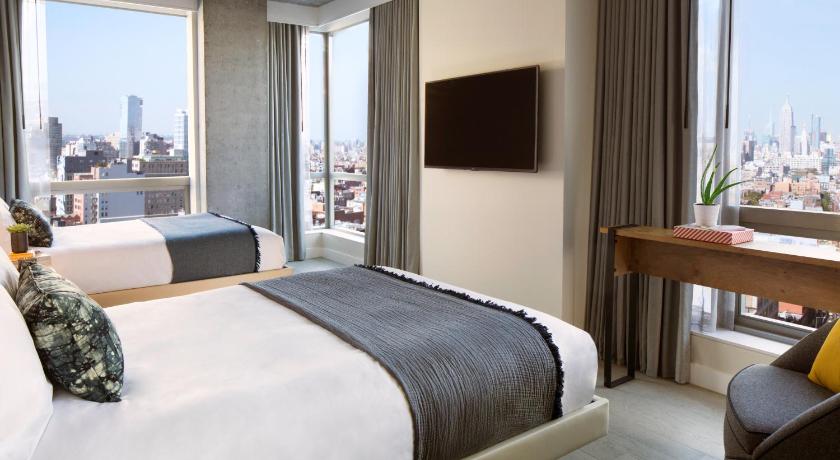 Image of 2 Double Beds With City View 1
