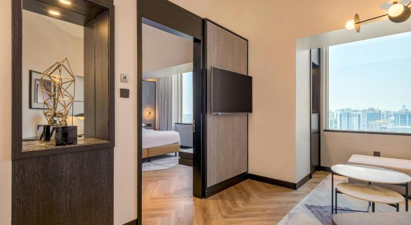 Image of Family Deluxe Suite, Club lounge access, 2 Bedroom Suite, Bedroom 1: 1 King, Bedroom 2: 2 Twin 8