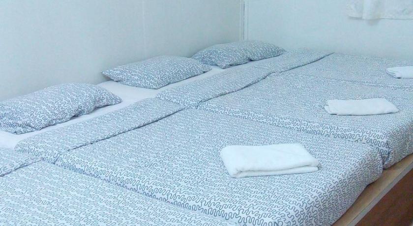 Image of Triple Room with Shared Bathroom 6