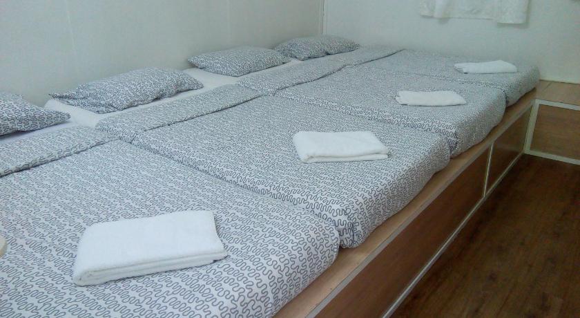 Image of Triple Room with Shared Bathroom 8