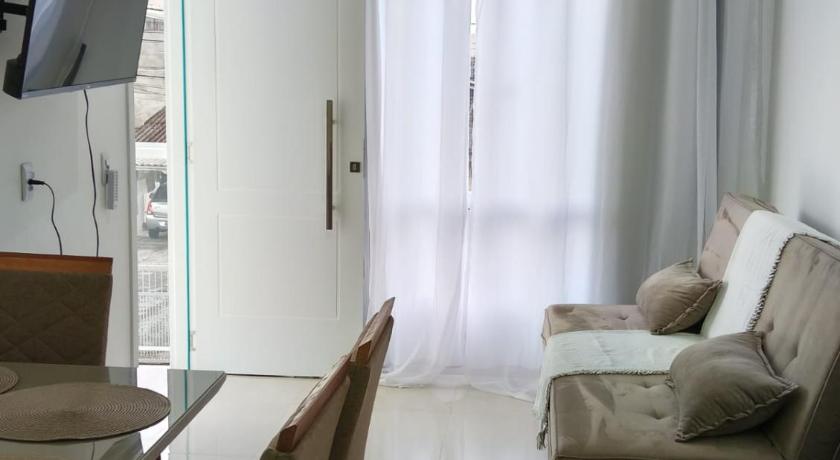 Foto Apto Moderno a 700 metros da praia com varanda - Booking Diskon Spesial