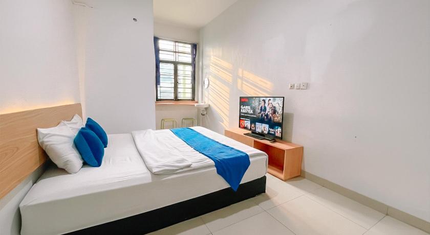 OYO 91283 Sg Premium Guest House - image 25