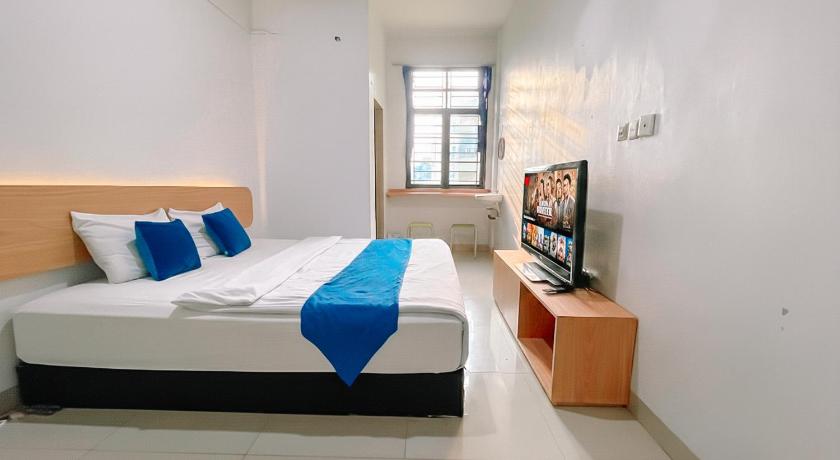 OYO 91283 Sg Premium Guest House - image 26