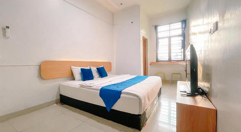 OYO 91283 Sg Premium Guest House - image 18