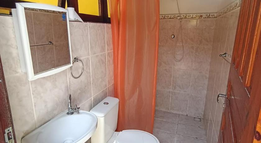 Image of Economy Quadruple Room with External Bathroom 2