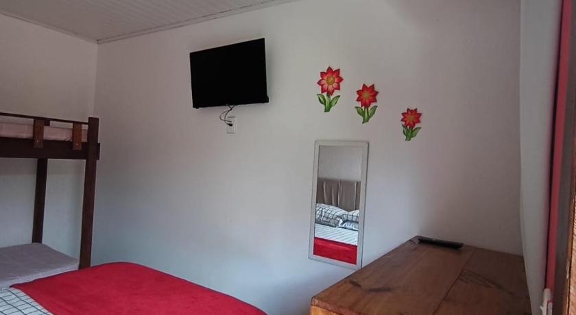 Image of Economy Quadruple Room with External Bathroom 3