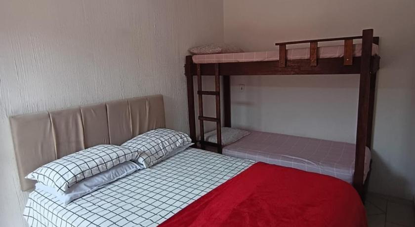 Image of Economy Quadruple Room with External Bathroom 1