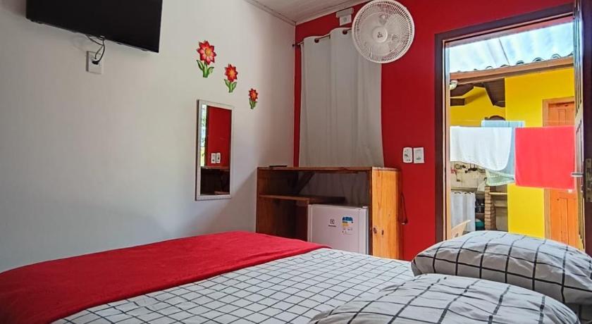 Image of Economy Quadruple Room with External Bathroom 0