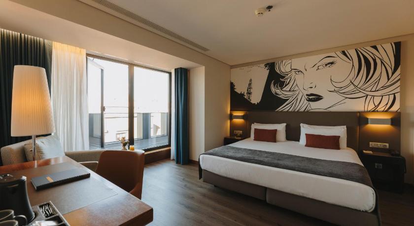 Image of Deluxe Room with Balcony 0