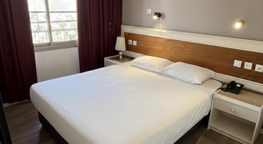 Imagem de Quarto com 2 Camas de Solteiro e Varanda (Twin Room with Balcony) 0