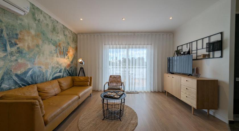 Image of One-Bedroom Apartment with Balcony and Water View 0