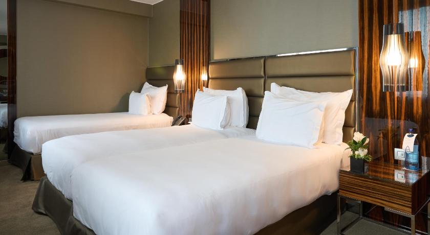 Фото: Трехместный номер Делюкс (Deluxe Triple Room) 1
