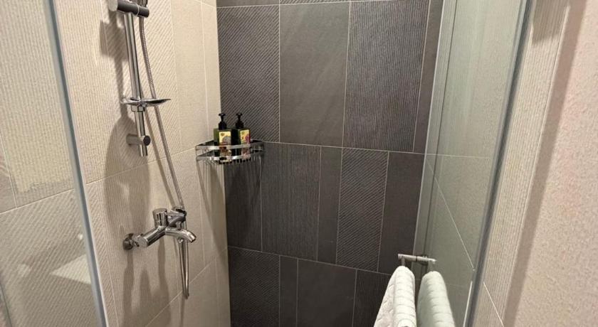 Image of Triple Room with Private Bathroom 2