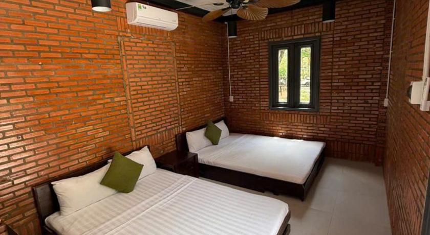 Phòng Tiêu Chuẩn 2 Giường Đơn Nhìn Ra Khu Vườn (Standard Twin Room with Garden View)tooltipPhòng Tiêu Chuẩn 2 Giường Đơn Nhìn Ra Khu Vườn (Standard Twin Room with Garden View)