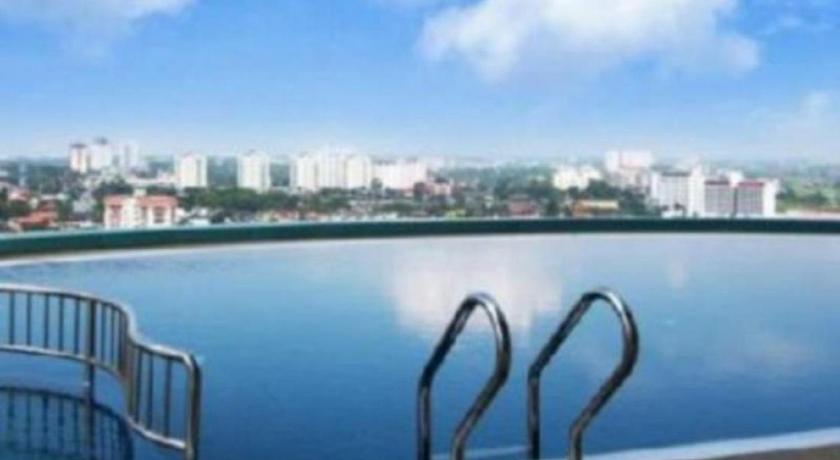 a row of water skis in front of a large body of water, Grand Paragon Hotel Johor Bahru in Johor Bahru
