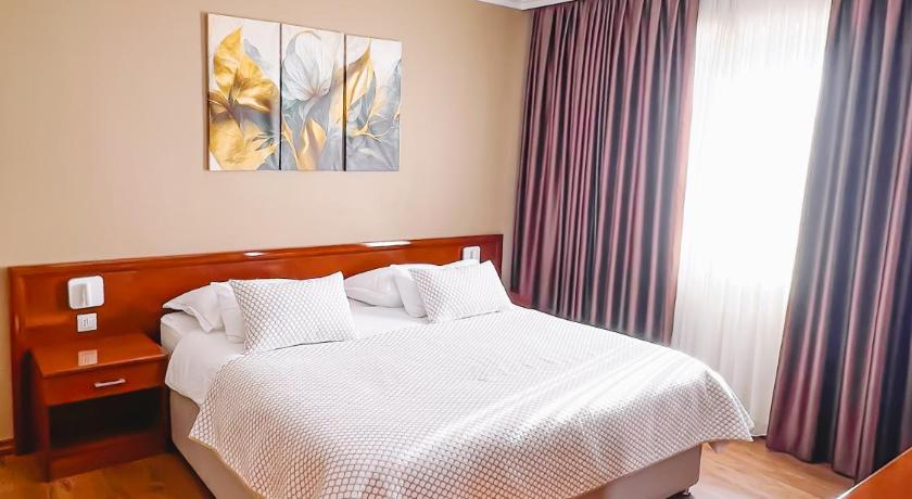 Image de Chambre Double - Vue sur Rivière (Double Room with River View) 1