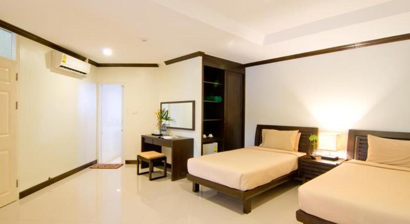 รูปของสแตนดาร์ด สวีท สำหรับครอบครัว เตียงใหญ่หรือเตียงแฝด วิวทะเล (Standard Suite Family Double Or Twin Sea View) 3