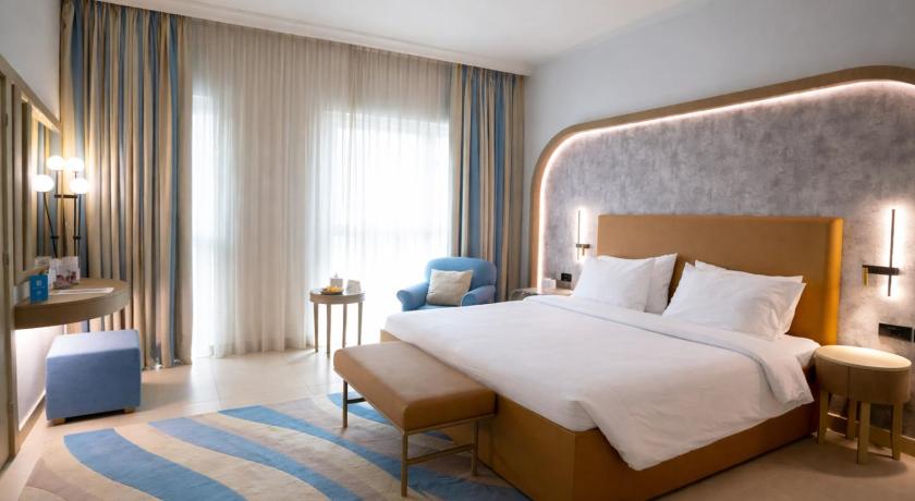 Image of Family Deluxe One Bedroom Suite City View 0