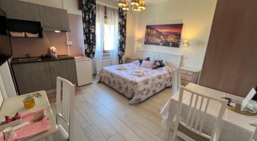 Camera con angolo cottura Pink Borgo Roma Verona