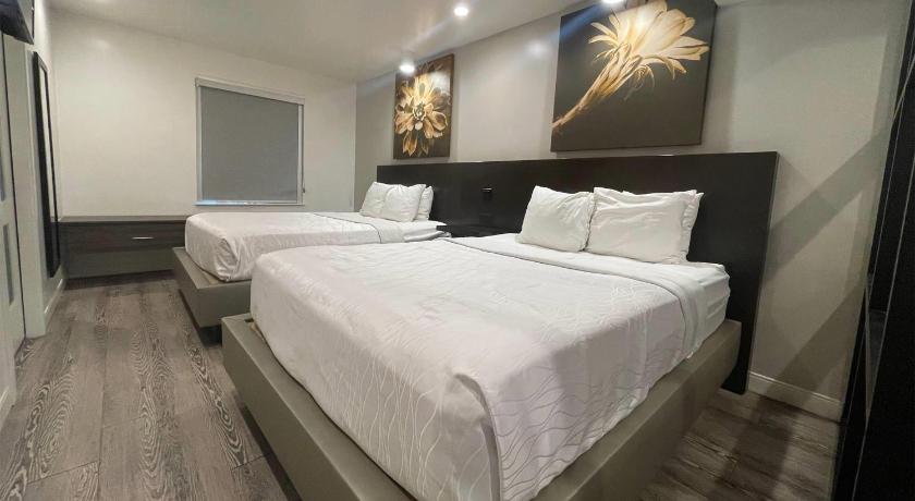 Zdjęcie: Apartament Deluxe z 2 łóżkami Queen – dla niepalących (2 Queen Beds, Deluxe Suite, Non-Smoking) 3