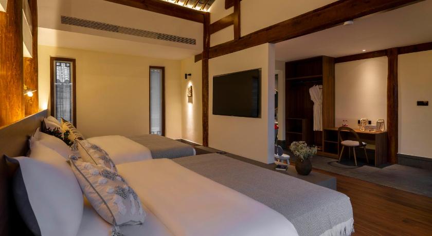 Lijiang 花筑奢良栖阁客栈 Hotel room