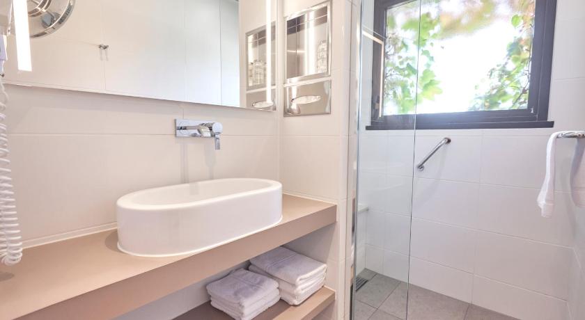 Image of Triple Room with Garden View and Balcony 2