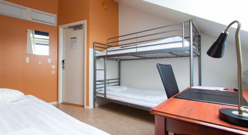 Image of Basic Triple Room with Shared Bathroom 1