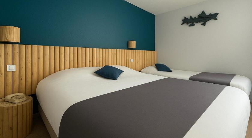 Image of Triple Room (2 Adults + 1 Child) 0
