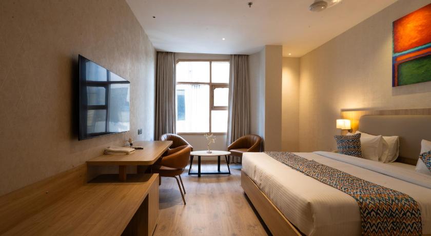 Hotel Bluestone Prime Nehru Place by The Cosy hotels