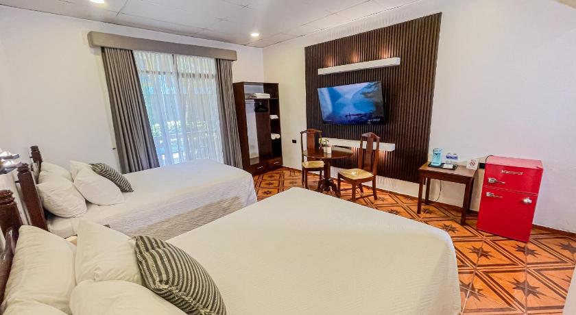 Immagine di Camera Doppia con Letti Singoli con Balcone (Twin Room with Balcony) 0