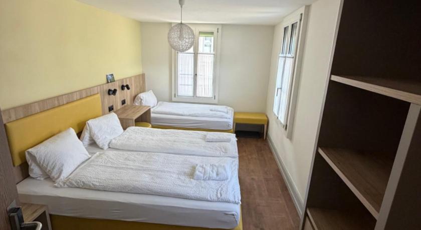 Image of Triple Room with Shared Bathroom 4
