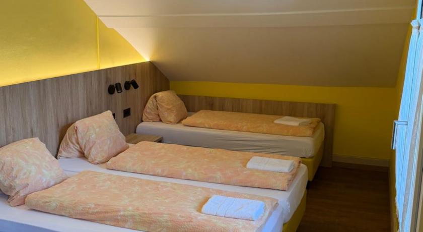 Image of Triple Room with Shared Bathroom 5