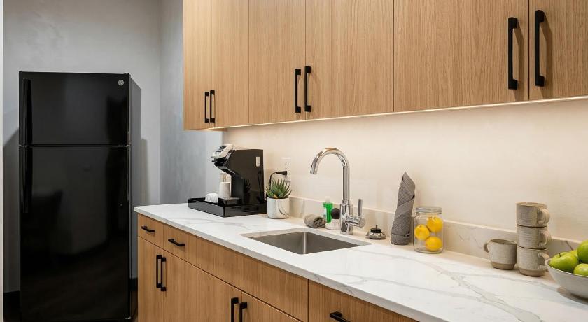 Image of Premium Kitchenette Room with Two Queen Beds- Wheelchair Accessible 1