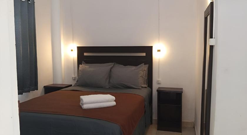 Image of Double Bed Room With Air conditioning 0