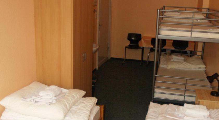 Image of Quadruple Room with Shared Bathroom 5