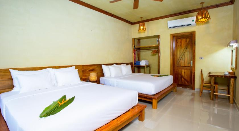 Image of Deluxe Triple Room 0