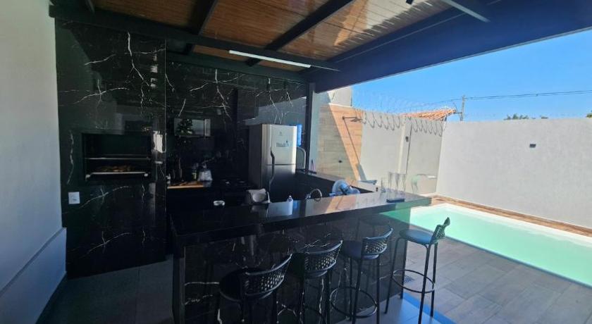 Baza um lugar perfeito para descansar, piscina aquecida, ar condicionado, garagem coberta e etc